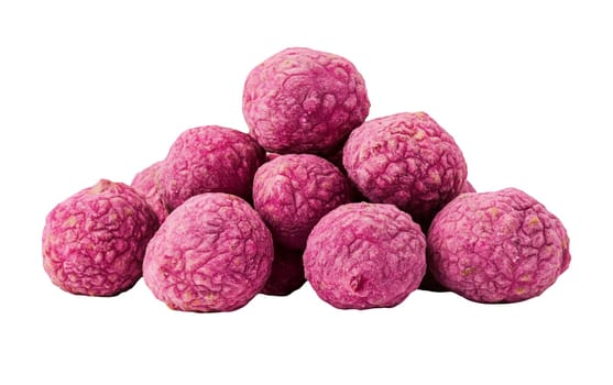 A stack of vibrant pink dried limes displayed against a solid white background, showcasing texture and color contrast. Isolated on white background.