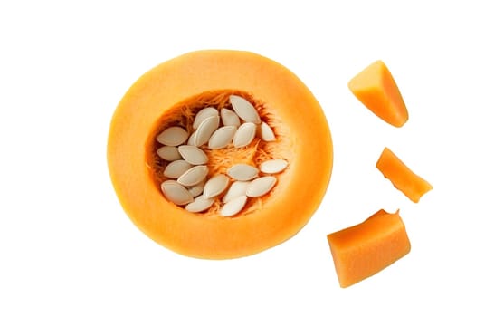 A sliced pumpkin showing its seeds and vibrant orange flesh, ideal for autumn cooking and decoration. Isolated on white background.