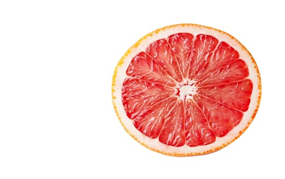 A fresh slice of grapefruit with vibrant pink hues, isolated on a white background with ample copy space. Isolated on white background.