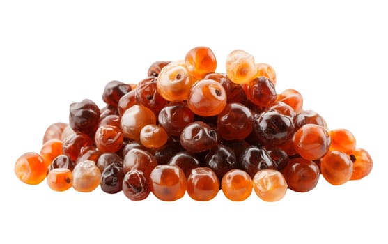 A heap of dried berries in varying shades of brown and orange, highlighting their rich colors and preserved textures. Isolated on white background.