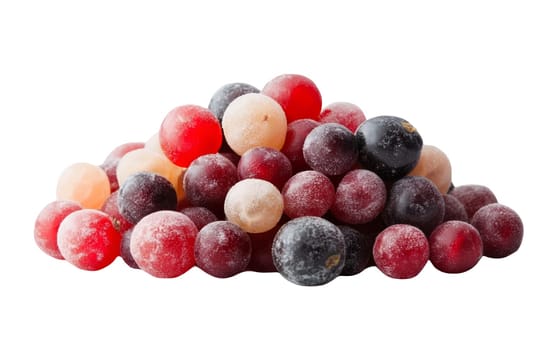 An assortment of frosted berries in various colors, creating a visually appealing and cool effect against a white background. Isolated on white background.