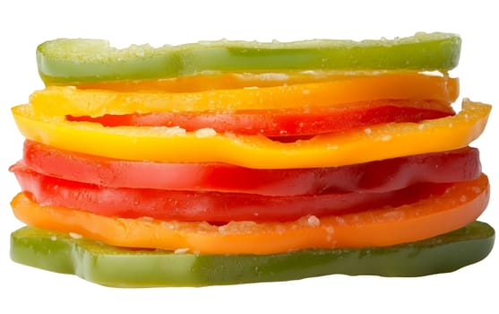 A stack of colorful pepper slices in red, yellow, and green hues, showcasing freshness and vibrant colors. Isolated on white background.