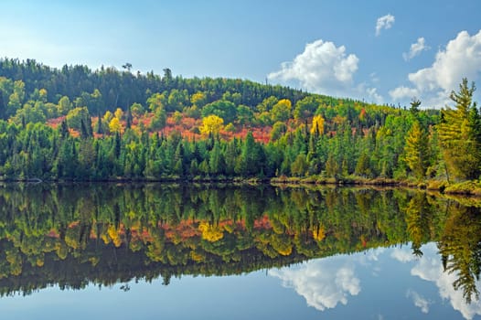 Autumn Reflections on a Quiet Lake on Lonely Lake on the Gunflint trail in Minnesota