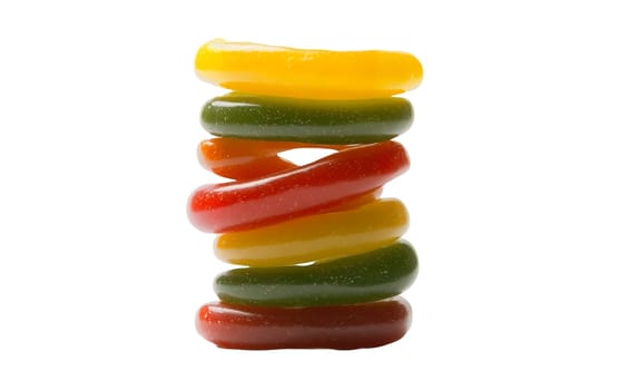 A playful stack of spiral gummy candies in assorted colors, highlighting their fun and vibrant appeal. Isolated on white background.