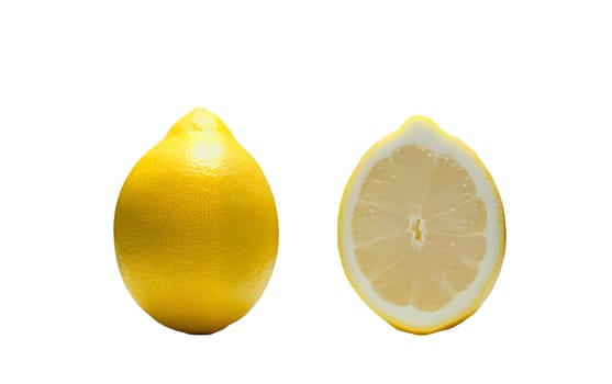 A whole lemon next to a halved lemon, showcasing the bright yellow peel and juicy interior. Isolated on white background.