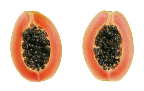 Two halved papayas with rich orange flesh and white seeds, presenting a vibrant tropical fruit scene. Isolated on white background.
