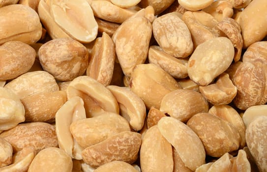 Heap of roasted peeled peanuts, close up