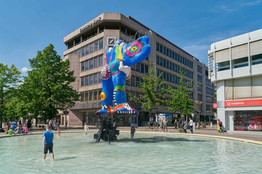 The Life Saver fountain by artist Niki de Saint Phalle and her husband Jean Tinguely in the city center of Duisburg in Germany