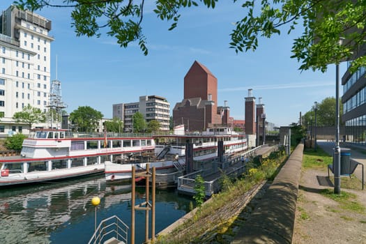 Passenger ships of the weisse Flotte, white fleet in the port of Duisburg in Germany