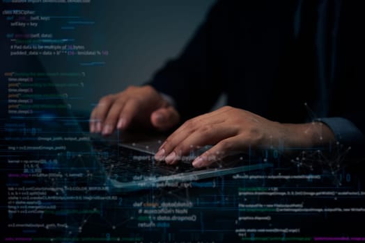 Hands typing on a laptop with visible coding and encryption data, representing cybersecurity and software development. Ideal for IT security, programming, and coding education.