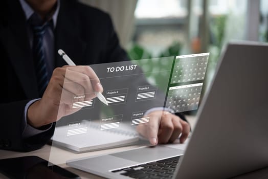 Businessman organizing tasks on digital to-do list, calendar interface. Represents project management, productivity, effective planning. Ideal for business organization, time management visuals.