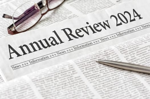 A newspaper with the headline Annual review 2024