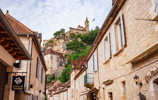 Rocamadour, France - June 18, 2024: View from the main street at the bottom of the village of Rocamadour, a famous cliffside village, Lot, Occitanie, France