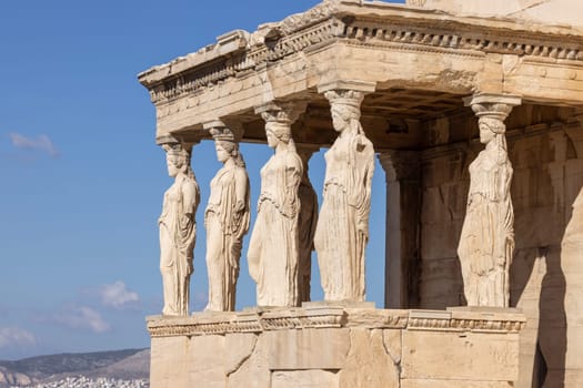 Athens, Greece - October 17, 2022: Erechtheion, Temple of Athena Polias on Acropolis of Athens. View of The Porch of the Maidens with statues of caryatids