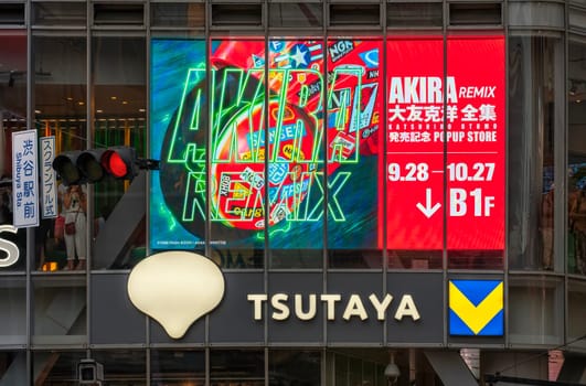 tokyo, shibuya - oct 02 2024: Screen advertising the POP UP STORE and DJ event held for the album AKIRA REMIX and manga Katsuhiro Otomo Complete Works on the facade of the Tsutaya of Shibuya Crossing.