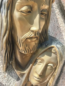 Mary and Jesus bronze statue. Death of Jesus. Resurrection. Easter.