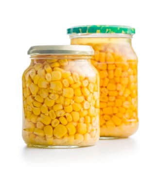 Canned sweet corn in jar isolated on a white background.