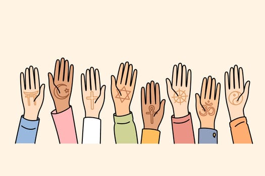 World religions day is celebrated by multiracial people by raising palms up as sign of unity and friendship. Christians and buddhists or muslims call for cooperation between different religions