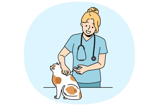Woman veterinarian inoculates cat to protect pet from dangerous viruses and bacteria. Smiling girl works as veterinarian in animal clinic and takes care of kitten in need of vaccination