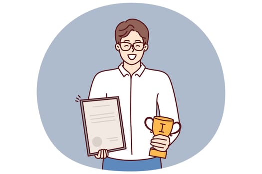 Businessman holds certificate and cup winner of competition among sellers company who exceeded sales plan. Businessman boasts letter of thanks received from partners corporation or managers