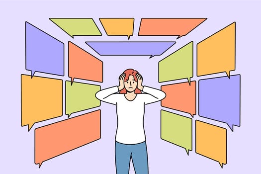 Information overload causes discomfort for woman standing among dialogue bubbles symbolizing bad news. Problem information overload in girl who feels pain in head and approaching depression