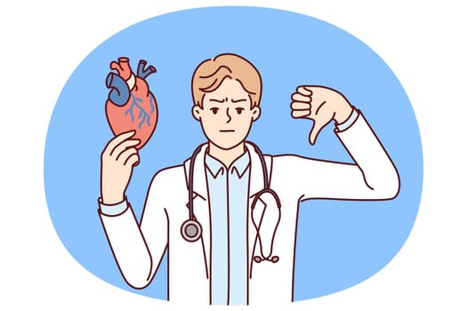 Man doctor for heart disease showing thumb down recommending taking medication or leading healthy lifestyle. Concept negative cardiac tests for patient and poor health of heart and circulatory system