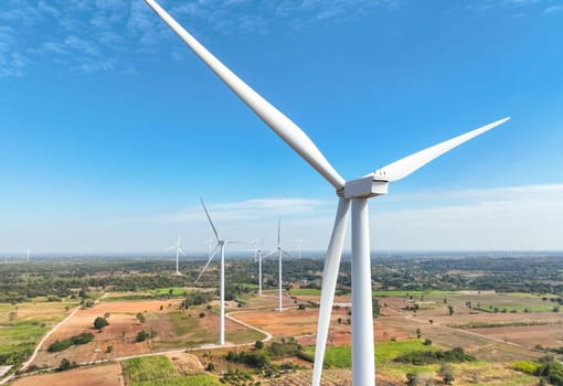 Wind energy and sustainable power generation with wind turbines, Eco-friendly solutions for renewable resources. Wind power farm and sustainable development of renewable energy, green technology.
