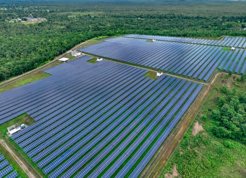 Aerial view of solar farm. Sustainable renewable energy and modern photovoltaic technology for eco-friendly electricity production. Solar power station. Green energy solutions. Solar panel technology.