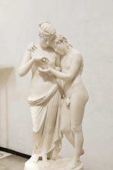 Possagno, Italy - 29 June 2023: Cupid and Psyche statue by sculptor Antonio Canova, 1800. Sensual hug, love and togetherness emotion.