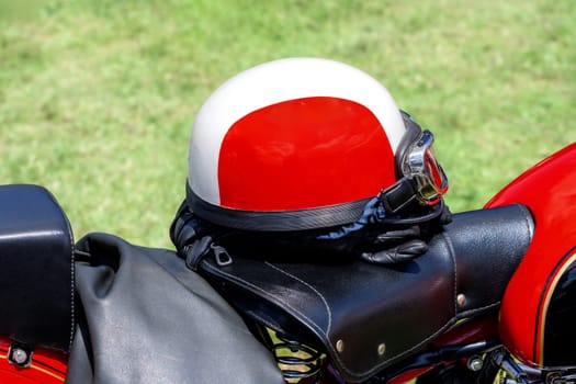 Old white vintage motorcycle helmet