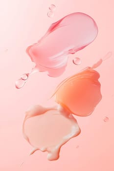Delicate swirls of pink and peach liquids blend gracefully against a soft, muted backdrop, creating a serene, artistic display.