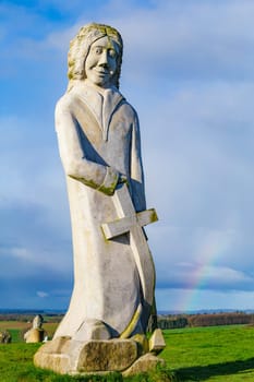 Carnoët, Bretagne, France - March 22th 2017 : Granite statue of Saint Riom, sculpted by sculptor Antoine Kito in Brittany's Valley of the Saints in Carnoet, Bretagne
