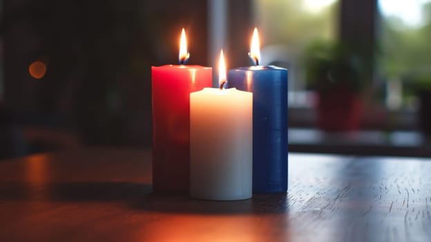 Simple arrangement of three candles in red, white, and blue.