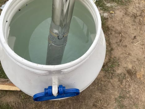 A submersible borehole pump is shown being installed to provide reliable access to groundwater. This image highlights the technology and equipment used to extract fresh water from deep underground sources