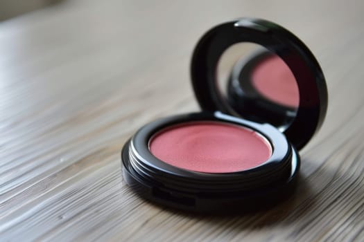 Blush compact in a rosy hue for a natural flush.