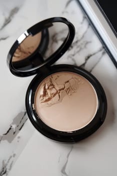 Face powder compact with a silky finish.
