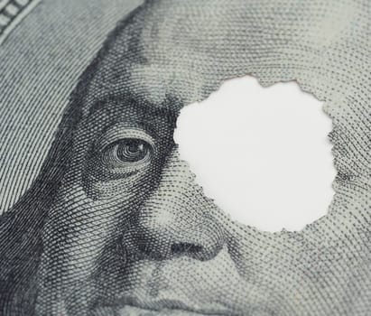 Fragment of a hundred dollar bill, hole with shadow, template for insertion