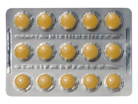 Blister pack with round yellow pills on isolated background, top view