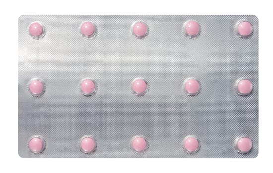 Blister pack with round pink pills on isolated background, top view