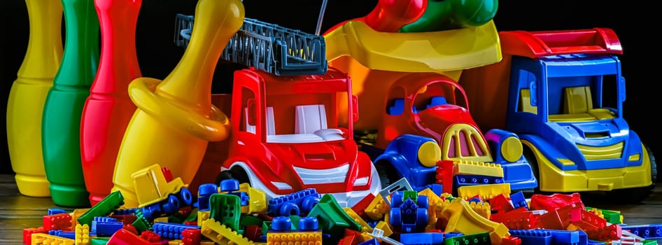 Composition with colorful plastic children toys.