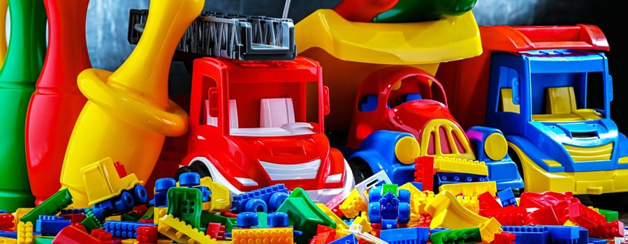 Composition with colorful plastic children toys.