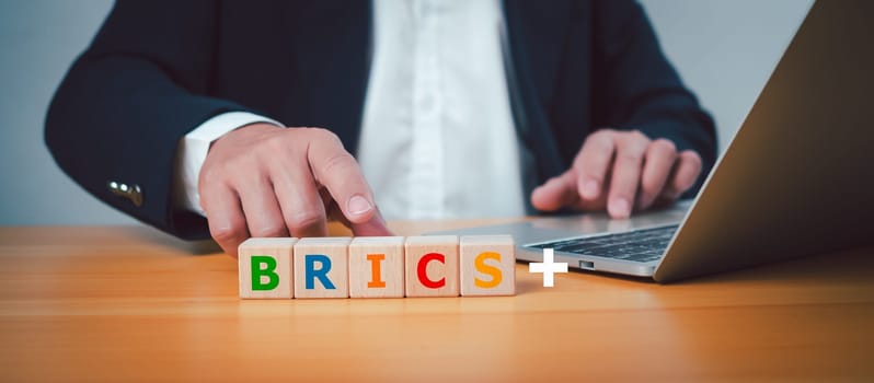BRICS economic business international cooperation concept, Wooden cube block at print screen letters Brics represent a group of countries with rapidly developing economies.