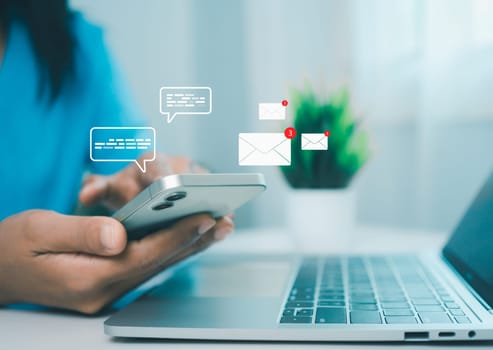 Online communication, online marketing, data link tech, Businesswoman holding smartphone and touching with virtual icon white newsletter for electronic mail or E-mail with notification alert.