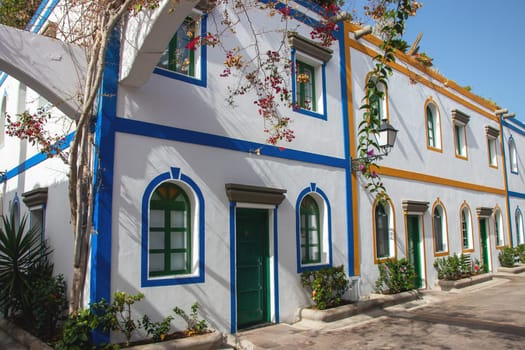 Gran Canaria, Spain, Jul 18, 2024. Puerto de Mogan, also called little Venice, with a small fishing harbour, romantic alleys and beautiful architecture. Popular town with shopping facilities, restaurants and pubs.