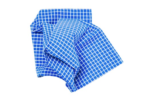 Closeup of a blue and white checkered napkin or tablecloth texture isolated on white background. Kitchen accessories. Top view.