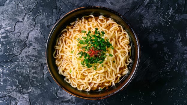 Aerial shot of a spinning bowl of ramen noodles