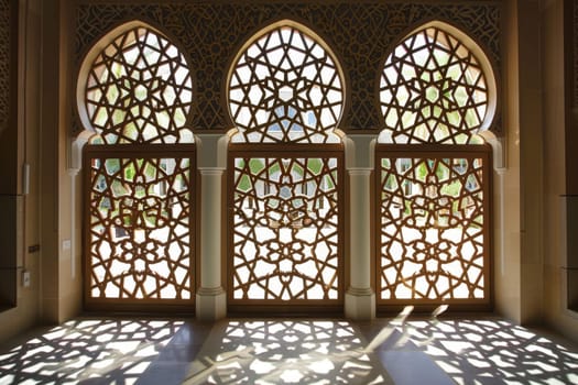 Decorative Islamic screens with geometric patterns, dividing spaces while adding visual interest.