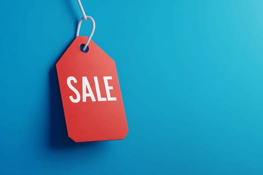 A vibrant red tag displaying the word sale hangs against a solid blue background, creating a bold promotional statement.