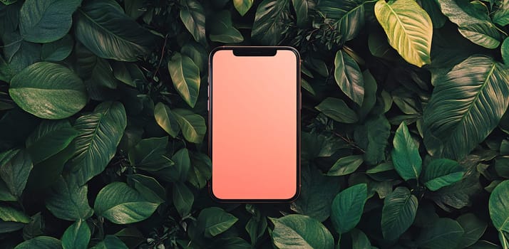 A modern smartphone sits surrounded by vibrant green leaves, showcasing a minimalist and nature-inspired aesthetic in daylight.
