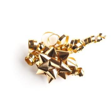 Golden bow with ribbon on a white background, holiday objects